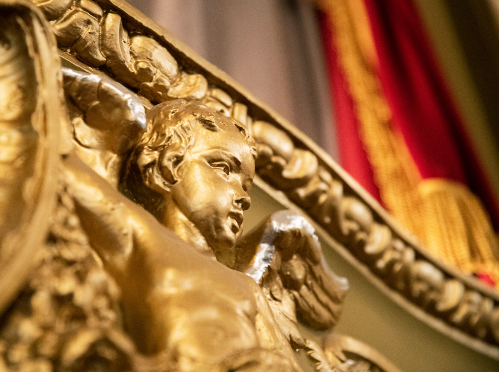 Golden angels are displayed along the walls